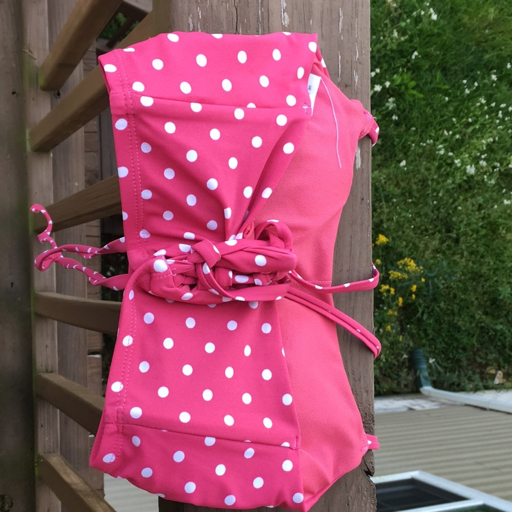 Pink and white poka dotted bikink. mid waisted